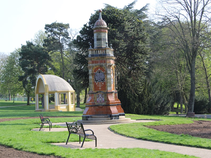 open park area with bandstand and memorial